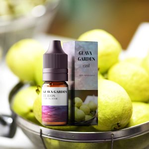 Bottle of Guava Garden flavored e-liquid with lush tropical garden-themed packaging, designed for vaping devices and highlighting a fresh fruity flavor profile.
